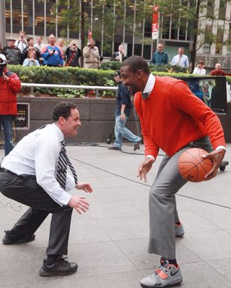 NEW YORK, NY - OCTOBER 12: (L-R) Fox & Friends host Brian Kilmeade plays a basketball game with NBA player Amar'e Stoudemire of the New York Knicks during a taping of 