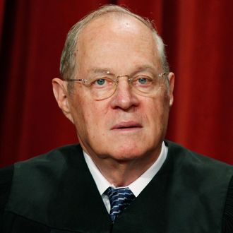 Justice Anthony M. Kennedy poses during a group photograph at the Supreme Court building on September 29, 2009 in Washington, DC.