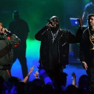 LOS ANGELES, CA - JUNE 26: (L-R) Rappers DJ Khaled, Rick Ross, and singer Drake perform onstage during the BET Awards '11 held at the Shrine Auditorium on June 26, 2011 in Los Angeles, California. (Photo by Kevin Winter/Getty Images)