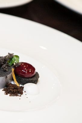 Black sesame panna cotta, sour cherry sphere, mandarin sorbet (Chef Laiskonis).