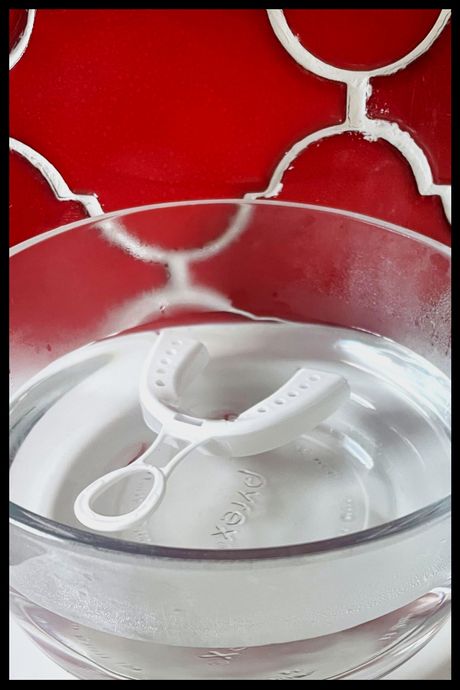 Setting up the DenTek Professional-Fit mouth guard in boiled water.