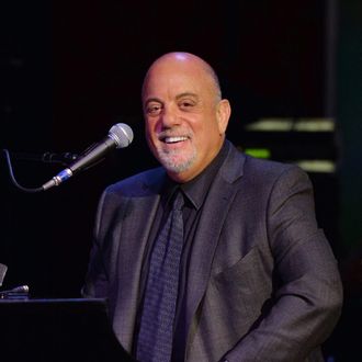 Billy Joel performs at SiriusXM's Town Hall with Billy Joel hosted by Howard Stern at The Cutting Room on April 28, 2014 in New York City. 