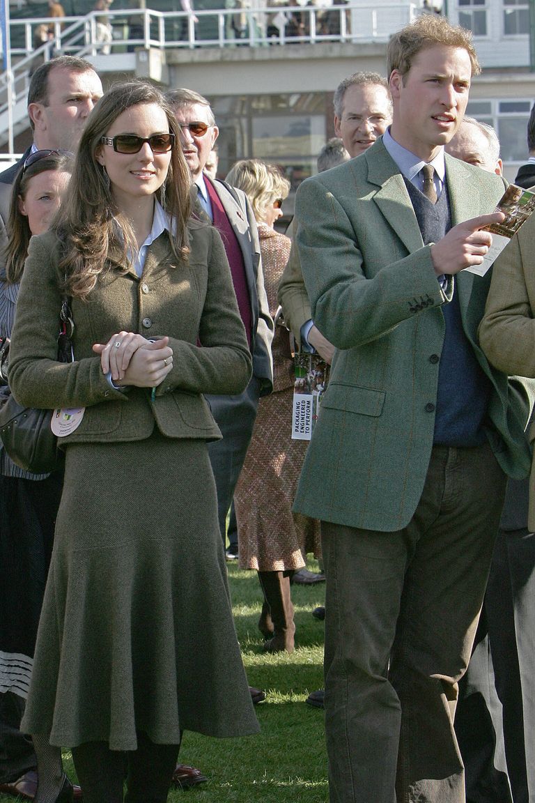 Cheltenham, UNITED KINGDOM: Prince William (R) stands beside girlfriend Kate Middleton (L) in the paddock enclosure on the first day of the annual Cheltenham Race Festival at Cheltenham Race course, west of England, 13 March 2007. AFP PHOTO/CARL DE SOUZA (Photo credit should read CARL DE SOUZA/AFP/Getty Images)