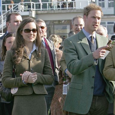 Cheltenham, UNITED KINGDOM: Prince William (R) stands beside girlfriend Kate Middleton (L) in the paddock enclosure on the first day of the annual Cheltenham Race Festival at Cheltenham Race course, west of England, 13 March 2007. AFP PHOTO/CARL DE SOUZA (Photo credit should read CARL DE SOUZA/AFP/Getty Images)