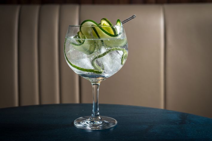 Gin and tonic with lime, cucumber, and fennel.