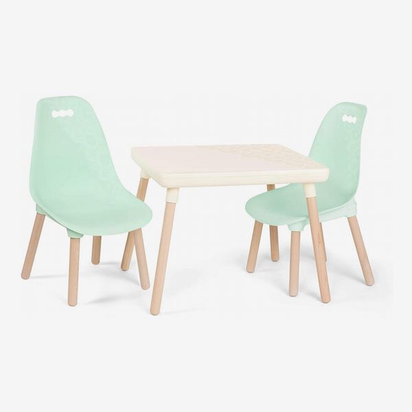 A B Toys Kids furniture set with two pale green plastic chairs and a cream colored table, all with light wood splayed legs. The Strategist - 48 Things on Sale You’ll Actually Want to Buy: From Sunday Riley to Patagonia