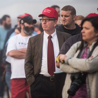 Donald Trump supporters wait in line before a campaign rally for the Republican presidential candidate at Lenoir-Rhyne University March 14, 2016 in Hickory, North Carolina.