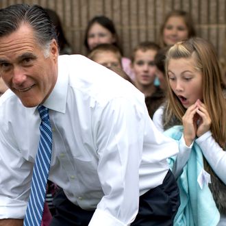 Republican presidential candidate, former Massachusetts Gov. Mitt Romney poses for photographs with students of Fairfield Elementary School, Monday, Oct. 8, 2012, in Fairfield, Va. 
