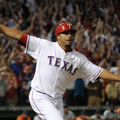 ARLINGTON, TX - OCTOBER 10: Nelson Cruz #17 of the Texas Rangers runs the bases after hitting a walk off grand slam home run in the bottom of the 11th inning to win Game Two of the American League Championship Series 7-3 against the Detroit Tigers at Rangers Ballpark in Arlington on October 10, 2011 in Arlington, Texas. (Photo by Harry How/Getty Images)