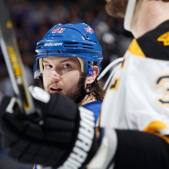 Rick Nash #61 of the New York Rangers skates against Zdeno Chara #33 of the Boston Bruins in Game Three of the Eastern Conference Semifinals during the 2013 NHL Stanley Cup Playoffs at Madison Square Garden on May 21, 2013 in New York City. 