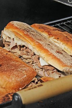 Jose Cubano, porchetta-style belly roll, shredded pork butt on Parisi Italian roll