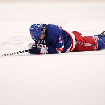 NEW YORK, NY - MARCH 17: Michael Del Zotto #4 of the New York Rangers lays on the ice after the loss to the Colorado Avalanche at Madison Square Garden on March 17, 2012 in New York City. (Photo by Nick Laham/Getty Images) *** Local Caption *** Michael Del Zotto