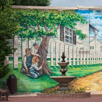 Mural depicting actors in the play and book, To Kill a Mockingbird. Located in historic downtown Mon