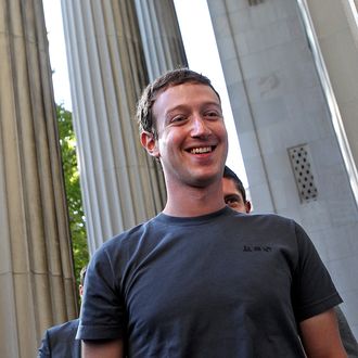 Facebook CEO, Mark Zuckerberg talks to the press before meeting with 200 students at MIT and Harvard.