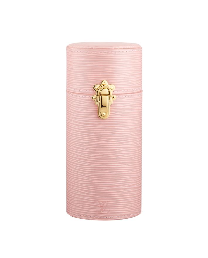 Louis Vuitton, a monogram perfume travel case, designed in a cylindrical  shape with the maker's sign