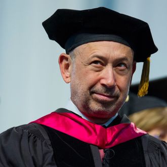 Lloyd Blankfein, chief executive officer of Goldman Sachs Group Inc., waits to be seated during the LaGuardia Community College 2013 commencement at the Jacob K. Javits center in New York, U.S., on Thursday, June 6, 2013. Blankfein told the graduating class that associating with ambitious people is one key to success in life. 