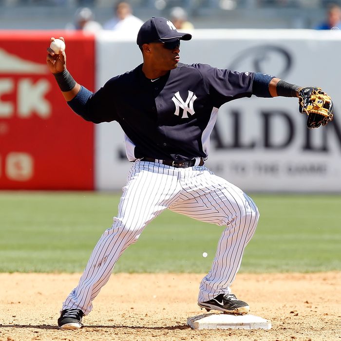 TAMPA, FL - MARCH 17: Infielder Robinson Cano #24 of the New York Yankees turns a double play against the Houston Astros during a Grapefruit League Spring Training Game at George M. Steinbrenner Field on March 17, 2012 in Tampa, Florida. (Photo by J. Meric/Getty Images)