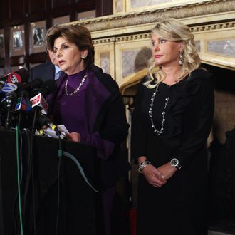 NEW YORK, NY - NOVEMBER 07: Sharon Bialek (R) listens as her attorney Gloria Allred (L) speaks during a news conference to accuse Republican presidential candidate Herman Cain of sexual harassment more than a decade ago on November 7, 2011 in New York City. Bialek is the fourth woman to accuse Cain of inappropriate behavior when he was while CEO of the National Restaurant Association. She stated she is speaking out because she wanted to give