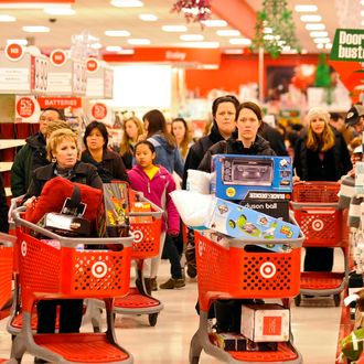 25 Nov 2011, Glenview, Illinois, USA --- epa03014629 Black Friday shoppers fill the aisles at a Target department store as they seek Christmas specials in Glenview, Illinois, 25 November 2011. Black Friday traditionally kicks off the holiday shopping season and gets its name from the day that most businesses target as the day they first turn a profit for the year. EPA/TANNEN MAURY --- Image by ? TANNEN MAURY/epa/Corbis