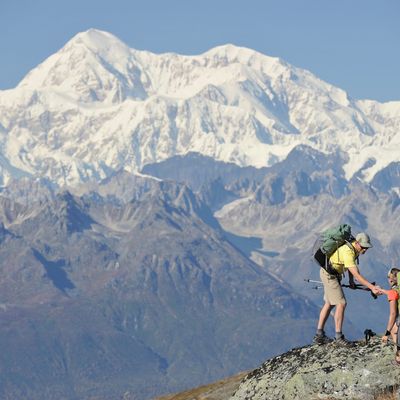 Backpackers hikes Kesugi Ridge Trail in Denali State Park, Alaska.
