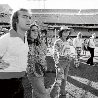 Bernie Taupin, Connie Pappas, and Kenny Passarelli survey the scene.