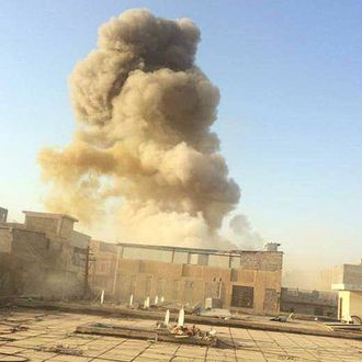 An Islamic State car bomb explodes at the gate of a government building near the provincial governor's compound in Ramadi during heavy fighting that saw most of the city fall to the militants. 