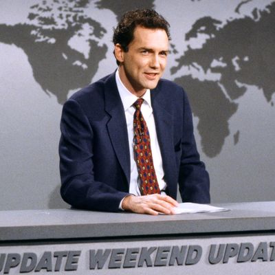SATURDAY NIGHT LIVE -- Episode 14 -- Pictured: Norm MacDonald during the 'Weekend Update' skit on February 22, 1997 -- (Photo by: Mary Ellen Matthews/NBC/NBCU Photo Bank)