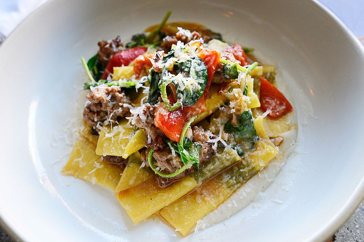 For his mint tacconi, Di Meglio encases the fresh herb in thinly rolled pasta and sauces it with lamb sausage, peppers, eggplant, and watercress.