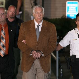 BELLEFONTE, PA - JUNE 22: Former Penn State assistant football coach Jerry Sandusky, leaves court in handcuffs after being convicted in his child sex abuse trial at the Centre County Courthouse on June 22, 2012 in Bellefonte, Pennsylvania. The jury found Sandusky guilty on 45 of 48 counts in the sexual abuse trial of the former Penn State assistant football coach, who was charged with sexual abuse of 10 boys over a 15-year period. (Photo by Mark Wilson/Getty Images)