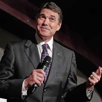 WATERLOO, IA - AUGUST 14: Republican presidential candidate and Texas Governor Rick Perry addresses the Blackhawk County Republican annual Lincoln Day Dinner at the Electric Park Ballroom August 14, 2011 in Waterloo, Iowa. Perry is in Iowa after announcing his candidacy for president a day earlier. (Photo by Chip Somodevilla/Getty Images)