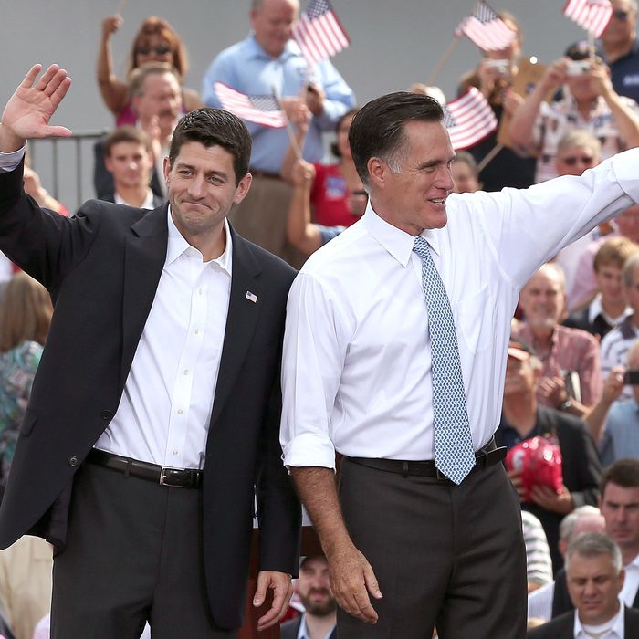 Republican presidential candidate, former Massachusetts Gov. Mitt Romney (R) and U.S. Rep. Paul Ryan (R-WI) wave as Ryan is announced as his vice presidential running mate in front of the USS Wisconsin August 11, 2012 in Norfolk, Virginia. Ryan, a seven term congressman, is Chairman of the House Budget Committee and provides a strong contrast to the Obama administration on fiscal policy.