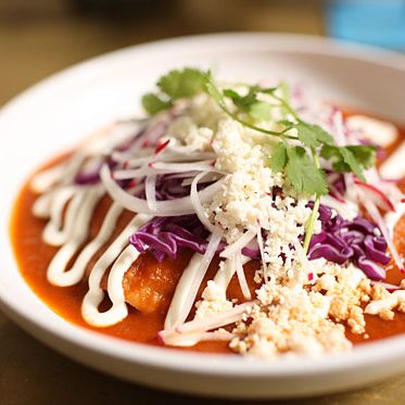 Sauteed hibiscus flowers, tomato-chipotle sauce, crema, queso fresco