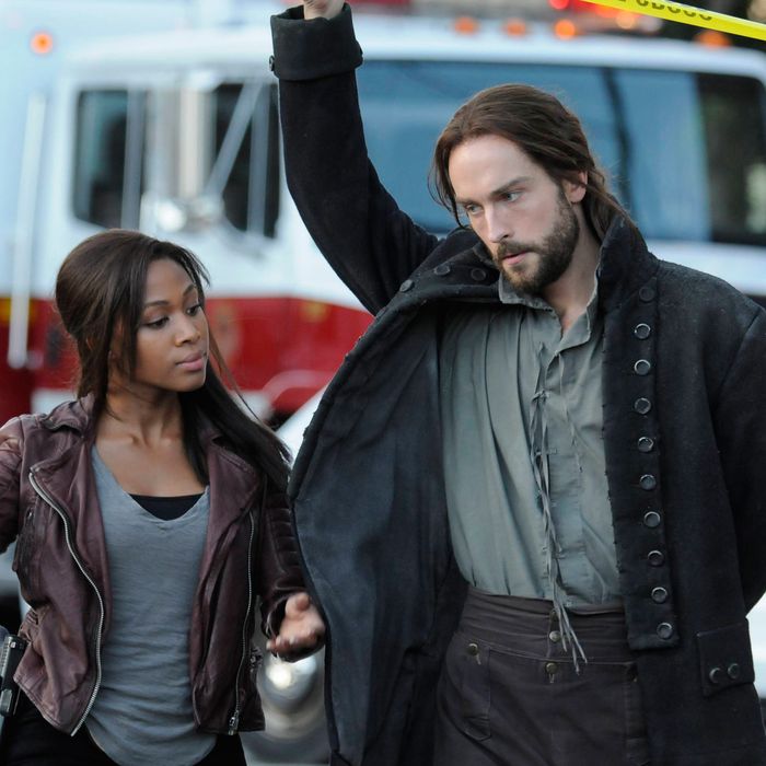 SLEEPY HOLLOW: Ichabod Crane (Tom Mison, R) helps Lt. Abbie Mills (Nicole Beharie, L) uncover a new evil soldier in Sleepy Hollow in the "For The Triumph of Evil" episode of SLEEPY HOLLOW airing Monday, Sept. 30 (9:00-10:00 PM ET/PT) on FOX. ©2013 Fox. Broadcasting Co. CR: Brownie Harris/FOX