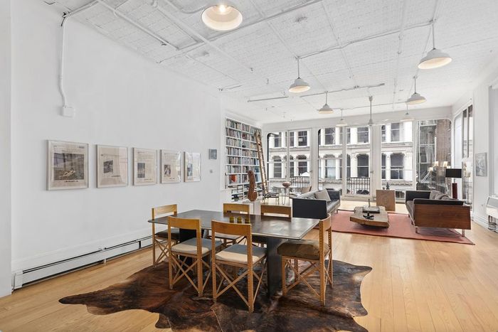 The apartment as it appeared before demolition, with a previous resident's furniture and art.
