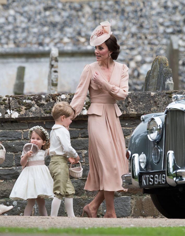 Princess Charlotte, Prince George, and Kate Middleton at Pippa Middleton's wedding.