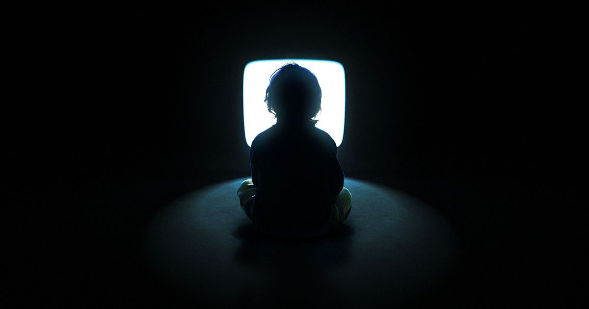 kids watching tv at night