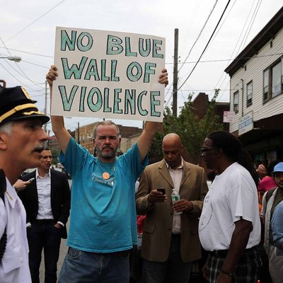 NEW YORK, NY - JULY 19: People participate in a demonstration against the death of Eric Garner after he was taken into police custody in Staten Island on Thursday on July 19, 2014 in New York City. New York Mayor Bill de Blasio announced in a news conference yesterday that there will be a full investigation into the circumstances surrounding the death of Garner. The 400-pound, 6-foot-4 asthmatic, Garner (43) died after police put him in a chokehold outside of a convenience store for illegally selling cigarettes. (Photo by Spencer Platt/Getty Images)