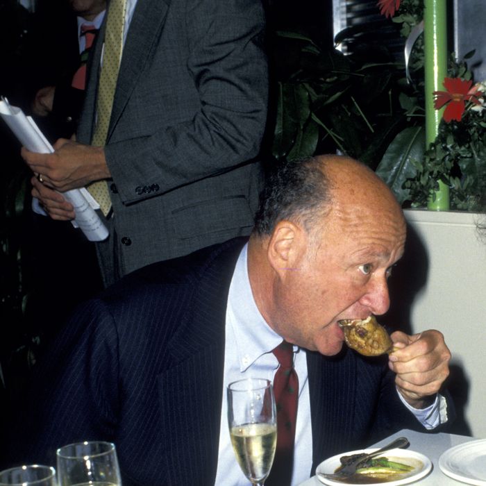 The man could eat: Koch at a 'Meals on Wheels' Benefit at Rockefeller Center in 1987.