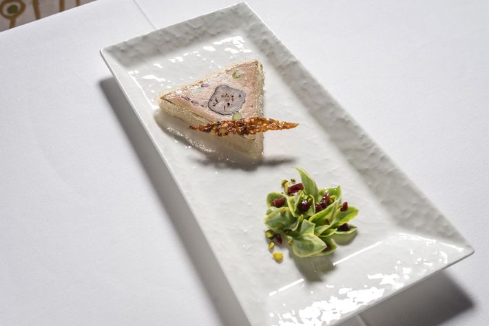 Foie-gras-and-rabbit-loin terrine with muscat gelée and five-pepper craquelin.