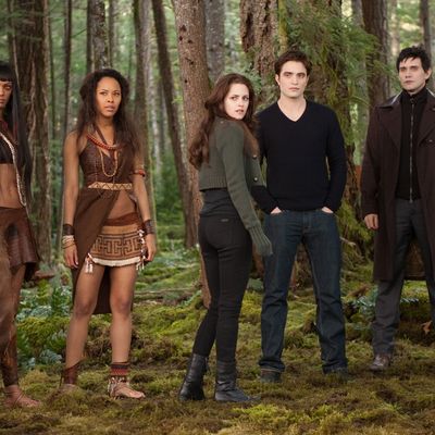 (L-R) JUDITH SHEKONI, TRACEY HEGGINS, KRISTEN STEWART, ROBERT PATTINSON, CHRISTIAN CAMARGO, PETER FACINELLI and CASEY LaBOW star in THE TWILIGHT SAGA: BREAKING DAWN-PART 2.Ph: Andrew Cooper, SMPSP? 2011 Summit Entertainment, LLC. All rights reserved.