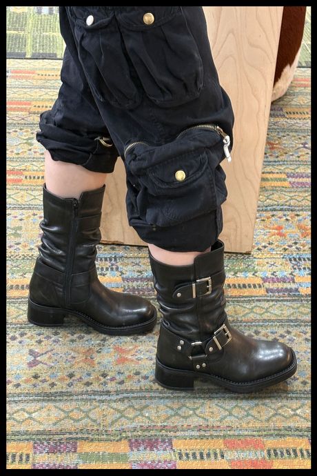 The author wearing Eric Michael Lior boots.