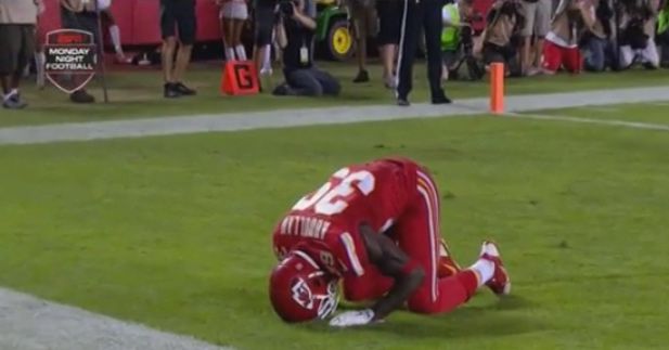 Kansas City Chiefs free safety Husain Abdullah carries the ball after  intercepting a pass and running it back 39 yards for a touchdown during the  fourth quarter of an NFL football game