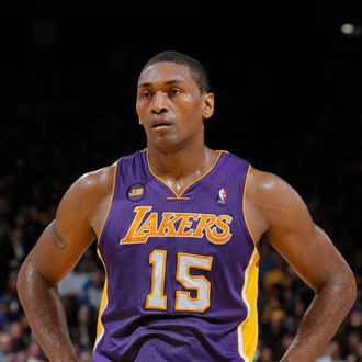 OAKLAND, CA - MARCH 25: Metta World Peace #15 of the Los Angeles Lakers in a game against the Golden State Warriors on March 25, 2013 at Oracle Arena in Oakland, California. NOTE TO USER: User expressly acknowledges and agrees that, by downloading and or using this photograph, user is consenting to the terms and conditions of Getty Images License Agreement. Mandatory Copyright Notice: Copyright 2013 NBAE (Photo by Rocky Widner/NBAE via Getty Images)