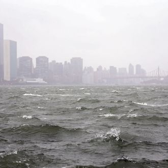 NEW YORK, NY - OCTOBER 29: Waves pick up on the East River ahead of Hurricane Sandy on eastside of Manhattan on October 29, 2012 in New York City. Sandy, which has already claimed over 50 lives in the Caribbean is predicted to bring heavy winds and floodwaters to the mid-Atlantic region. (Photo by Michael Heiman/Getty Images)