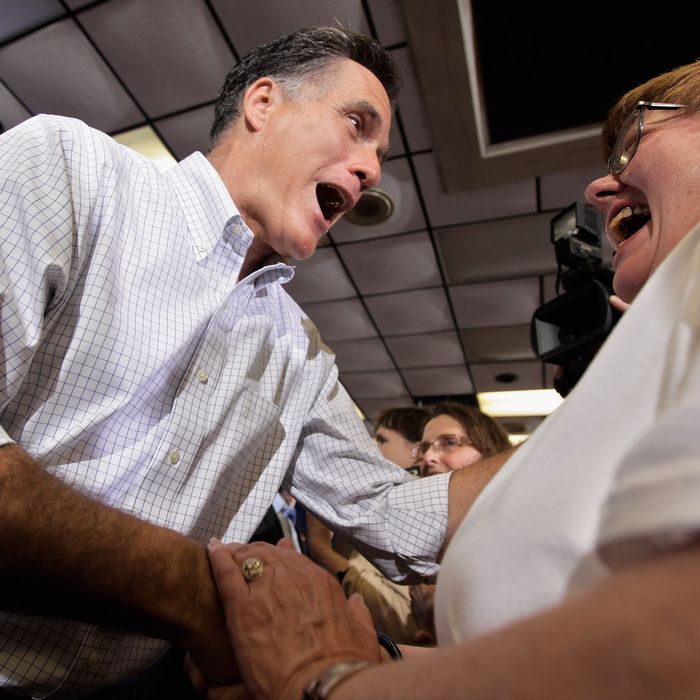 MOLINE, IL - MARCH 18: Republican presidential candidate, former Massachusetts Gov. Mitt Romney greets supporters during a pancake brunch at the American Legion Post 246 March 18, 2012 in Moline, Illinois. Romney is campaigning in Illinois three days before that state’s primary elections March 21, when 54 GOP delegates are up for grabs. With Romney in the lead on delegates, fellow candidate, former Pennsylvania Sen. Rick Santorum continues to compete for the 1,444 necessary to secure the nomination before the last primary, in Utah on June 26. (Photo by Chip Somodevilla/Getty Images)