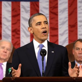 U.S. President Barack Obama, flanked by Vice President Joe Biden and House Speaker John Boehner (R-OH), gestures as State of the Union address during a jointhe gives his session of Congress on Capitol Hill on February 12, 2013 in Washington, D.C. Facing a divided Congress, Obama focused his speech on new initiatives designed to stimulate the U.S. economy.