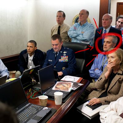 President Barack Obama and Vice President Joe Biden, along with with members of the national security team, receive an update on the mission against Osama bin Laden in the Situation Room of the White House, May 1, 2011. Please note: a classified document seen in this photograph has been obscured. (Official White House Photo by Pete Souza)This official White House photograph is being made available only for publication by news organizations and/or for personal use printing by the subject(s) of the photograph. The photograph may not be manipulated in any way and may not be used in commercial or political materials, advertisements, emails, products, promotions that in any way suggests approval or endorsement of the President, the First Family, or the White House.