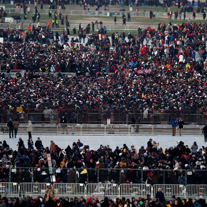 People begin to gather at the national mall before the presidential inauguration on the West Front of the U.S. Capitol January 21, 2013 in Washington, DC. Barack Obama was re-elected for a second term as President of the United States.