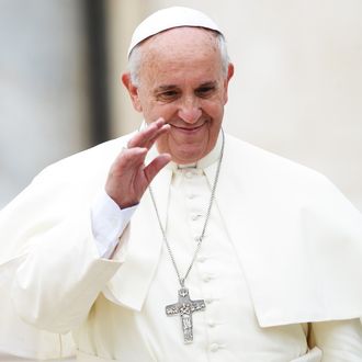 Pope Francis greets the crowd at the end of his general audience at St Peter's square on June 25, 2014 at the Vatican. 