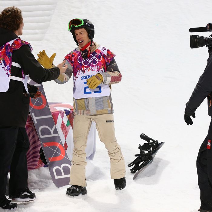 Shaun White of the United States congratulates gold medalist Iouri Podladtchikov of Switzerland after the Snowboard Men's Halfpipe Finals on day four of the Sochi 2014 Winter Olympics at Rosa Khutor Extreme Park on February 11, 2014 in Sochi, Russia. 